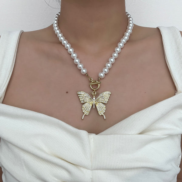 Collar con colgante de mariposa con cuentas y perlas artificiales 