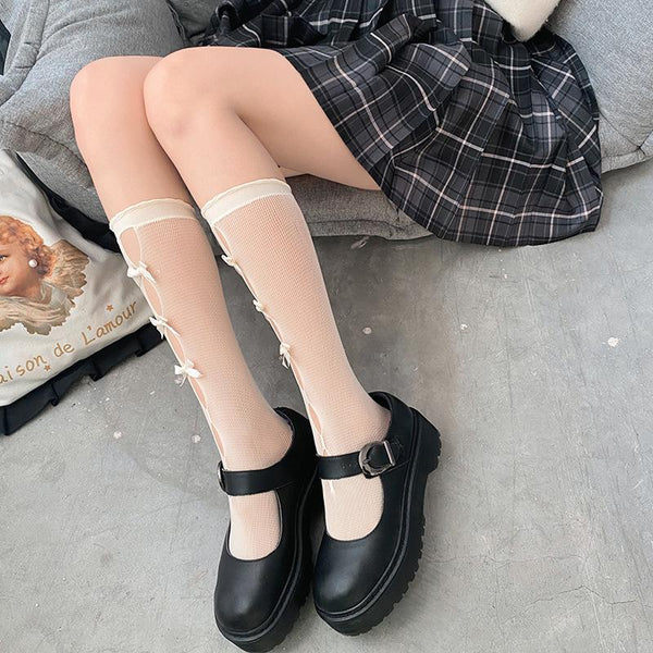 Solid bowknot hollow out long socks