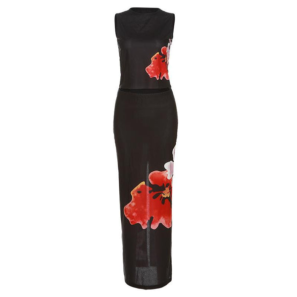 Conjunto de falda midi sin mangas en contraste con estampado de flores y aberturas de malla transparente 